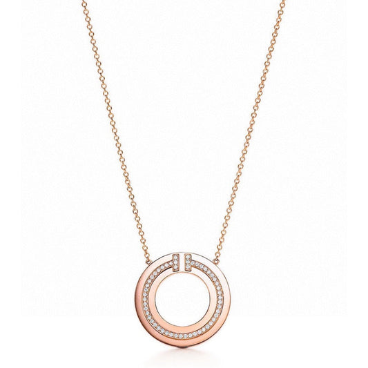 TIFFANY DIAMOND AND MOTHER OF PEARL CIRCLE PENDANT